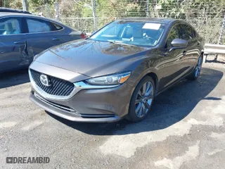 2018 Mazda Mazda6 Touring with VIN JM1GL1VM9J1309064, listed as a IAAI auction lot 41883495 with 250,781 mi miles. Bid and sale history available at carsss.com. Image 2.