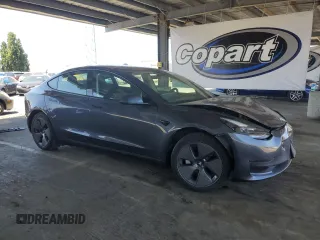 2023 Tesla Model 3 with VIN 5YJ3E1EA4PF456228, listed as a Copart auction lot 61442085 with 121,173 mi miles and Clean title. Bid and sale history available at DreamBid. Image 4.