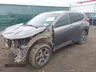 2018 Honda CR-V EX with VIN 7FARW2H58JE047009, listed as a IAAI auction lot 41943209 with 65,043 mi miles and . Bid and sale history available at DreamBid. Image 2.