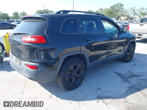 2016 Jeep Cherokee Latitude with VIN 1C4PJMCB3GW197446, listed as a IAAI auction lot 42087393 with 94,281 mi miles and . Bid and sale history available at carsss.com. Image 4.