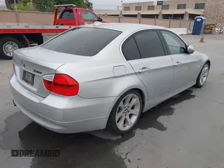 2006 BMW 3 Series 330i with VIN WBAVB33526KS31274, listed as a IAAI auction lot 42120518 with 167,203 mi miles. Bid and sale history available at carsss.com. Image 4.