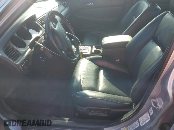 2002 Acura RL with VIN JH4KA96662C014359, listed as a Copart auction lot 55656515 with 107,884 mi miles and Salvage title. Bid and sale history available at DreamBid. Image 7.