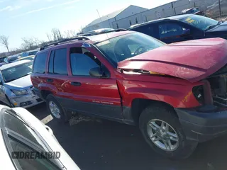 2003 Jeep Grand Cherokee Laredo with VIN 1J4GX48S13C594893, listed as a IAAI auction lot 41688597 with 179,680 mi miles. Bid and sale history available at carsss.com. Image 14.