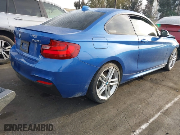 2015 BMW 2 Series 228i with VIN WBA1F5C59FVW98205, listed as a IAAI auction lot 41722804 with 91,879 mi miles. Bid and sale history available at carsss.com. Image 4.