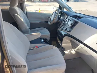 2011 Toyota Sienna LE AAS with VIN 5TDKK3DC9BS100414, listed as a IAAI auction lot 41901835 with 186,634 mi miles and . Bid and sale history available at DreamBid. Image 5.