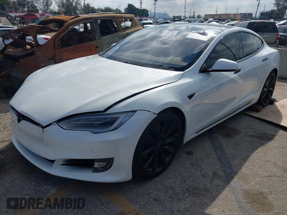2016 Tesla Model S 90D with VIN 5YJSA1E27GF153525, listed as a IAAI auction lot 41539221 with 145,771 mi miles and . Bid and sale history available at DreamBid. Image 17.