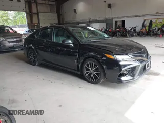 2021 Toyota Camry SE Nightshade with VIN 4T1G11AK6MU580771, listed as a IAAI auction lot 40042967 with 106,579 mi miles. Bid and sale history available at carsss.com. Image 1.