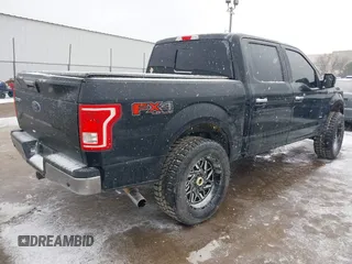 2016 Ford F-150 XLT with VIN 1FTEW1EPXGFA82102, listed as a IAAI auction lot 41560313 with 152,809 mi miles. Bid and sale history available at carsss.com. Image 4.