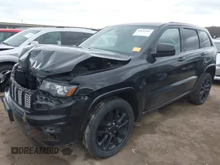 2017 Jeep Grand Cherokee Laredo with VIN 1C4RJFAG7HC886640, listed as a IAAI auction lot 42035301 with 197,110 mi miles. Bid and sale history available at carsss.com. Image 18.