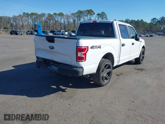 2018 Ford F-150 XL with VIN 1FTEW1EB3JKF67829, listed as a IAAI auction lot 41417816 with 219,899 mi miles and . Bid and sale history available at carsss.com. Image 4.