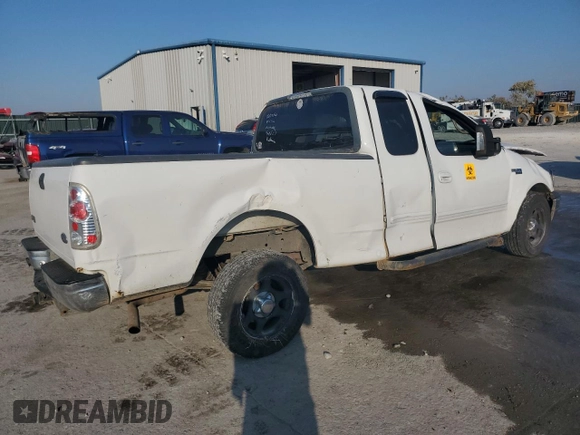 2000 Ford F-150 XL with VIN 1FTZX172XYNB23013, listed as a Copart auction lot 87393774 with 0 mi miles and Salvage Title. Bid and sale history available at carsss.com. Image 3.