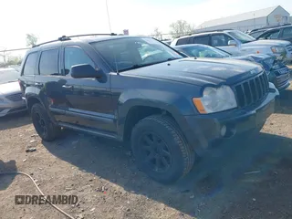 2007 Jeep Grand Cherokee Laredo with VIN 1J8GR48K77C582875, listed as a IAAI auction lot 42061653 with 259,767 mi miles. Bid and sale history available at carsss.com. Image 1.