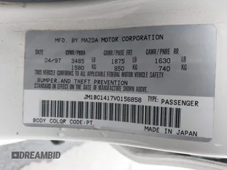 1997 Mazda Protege DX with VIN JM1BC1417V0156858, listed as a IAAI auction lot 42118339 with 187,673 mi miles and . Bid and sale history available at DreamBid. Image 9.
