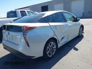 2017 Toyota Prius Two with VIN JTDKARFUXH3536565, listed as a IAAI auction lot 42374515 with 125,240 mi miles and . Bid and sale history available at DreamBid. Image 4.
