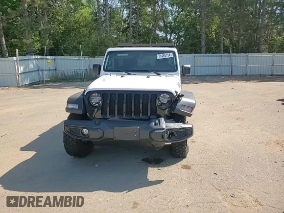 2022 Jeep Wrangler Unlimited Willys with VIN 1C4HJXDM0NW244953, listed as a Copart auction lot 71495154 with 14,577 mi miles and Salvage Title. Bid and sale history available at DreamBid. Image 11.