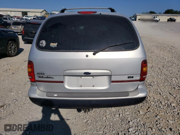 1998 Ford Windstar LX z VIN 2FMZA5145WBC60920, wystawiony jako Copart lot #71553874 z przebiegiem 232 744 mil mil oraz Nie do naprawy. Historia ofert i sprzedaży dostępna na DreamBid. Obrazek 6.