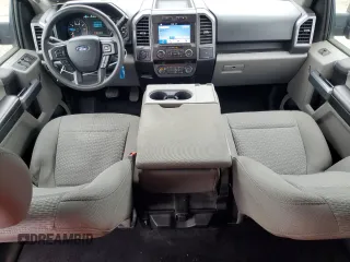2019 Ford F-150 XL with VIN 1FTEW1E54KFA20203, listed as a Copart auction lot 64373765 with 79,550 mi miles and Salvage title. Bid and sale history available at DreamBid. Image 8.