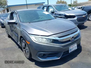 2016 Honda Civic EX-T with VIN 2HGFC3B33GH355312, listed as a IAAI auction lot 42465521 with 52,542 mi miles and . Bid and sale history available at DreamBid. Image 1.