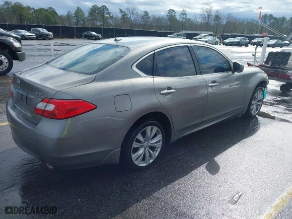 2011 Infiniti M37 with VIN JN1BY1AR7BM375807, listed as a IAAI auction lot 41716432 with 167,343 mi miles. Bid and sale history available at carsss.com. Image 4.