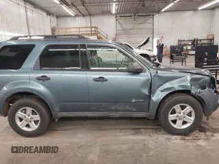 2011 Ford Escape Hybrid с VIN 1FMCU5K34BKC19603, выставлен на аукционе IAAI как лот 41895045 с пробегом 117 922 миль миль и . История ставок и продаж доступна на DreamBid. Изображение 14.