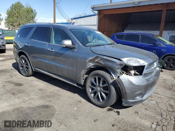 2013 Dodge Durango Crew with VIN 1C4RDJDG7DC554102, listed as a Copart auction lot 54045335 with 228,176 mi miles and Salvage Title. Bid and sale history available at DreamBid. Image 4.
