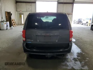 2014 Dodge Grand Caravan SE with VIN 2C4RDGBG6ER463529, listed as a Copart auction lot 51830695 with 105,675 mi miles and Salvage Title. Bid and sale history available at DreamBid. Image 6.