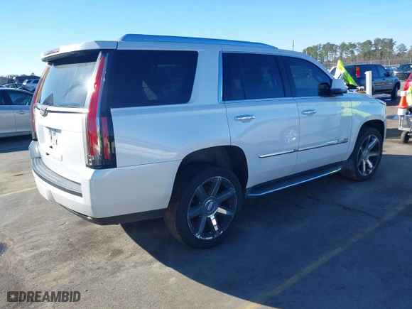 2016 Cadillac Escalade Luxury Collection with VIN 1GYS4BKJ4GR339343, listed as a IAAI auction lot 41456214 with 114,777 mi miles. Bid and sale history available at carsss.com. Image 4.