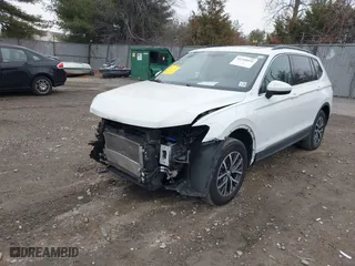 2020 Volkswagen Tiguan SE with VIN 3VV2B7AX0LM075033, listed as a IAAI auction lot 41310056 with 82,548 mi miles. Bid and sale history available at carsss.com. Image 17.