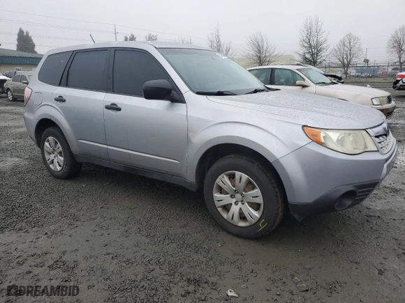 2012 Subaru Forester 2.5X with VIN JF2SHBAC7CH425700, listed as a Copart auction lot 87875805 with 148,001 mi miles and Salvage Title. Bid and sale history available at carsss.com. Image 4.