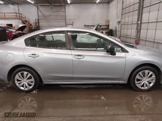 2019 Subaru Impreza with VIN 4S3GKAB63K3600089, listed as a IAAI auction lot 41849888 with 48,397 mi miles. Bid and sale history available at carsss.com. Image 14.