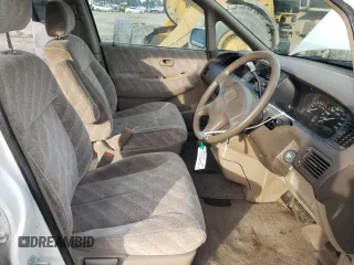 1998 Honda Odyssey with VIN RA31038664, listed as a Copart auction lot 43051785 with 106,084 mi miles and Salvage title. Bid and sale history available at DreamBid. Image 7.