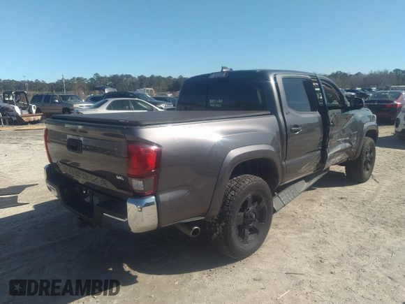 2018 Toyota Tacoma SR5 with VIN 5TFAZ5CN0JX056706, listed as a IAAI auction lot 41774141 with 31,738 mi miles and . Bid and sale history available at DreamBid. Image 4.