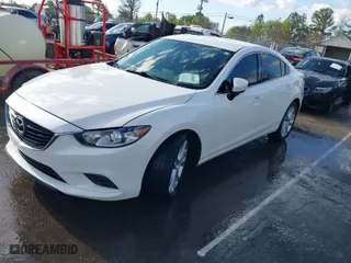 2017 Mazda Mazda6 Touring with VIN JM1GL1V59H1128856, listed as a IAAI auction lot 41803837 with 164,378 mi miles. Bid and sale history available at carsss.com. Image 2.