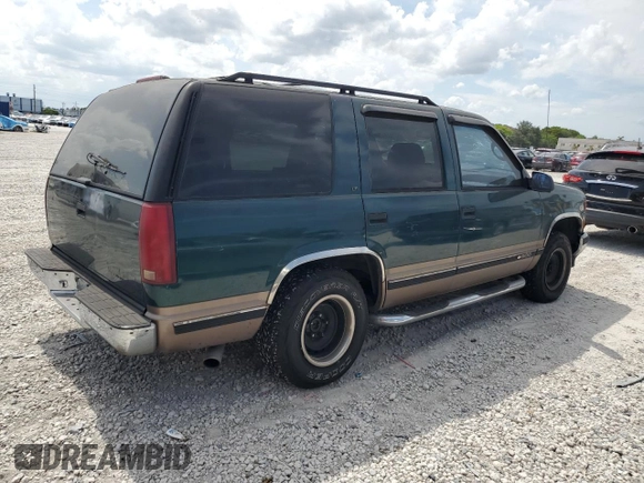 1995 Chevrolet Tahoe z VIN 1GNEC13K1SJ439759, wystawiony jako Copart lot #57784845 z przebiegiem 190 566 mil mil oraz Czysty tytuł • Clean title. Historia ofert i sprzedaży dostępna na DreamBid. Obrazek 3.