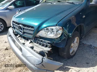 1998 Mercedes-Benz M-Class with VIN 4JGAB54E0WA024864, listed as a IAAI auction lot 39138301 with 200,546 mi miles. Bid and sale history available at carsss.com. Image 6.