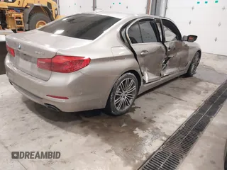 2019 BMW 5 Series 540i xDrive with VIN WBAJE7C58KWW24695, listed as a IAAI auction lot 41346095 with 65,374 mi miles and . Bid and sale history available at carsss.com. Image 4.