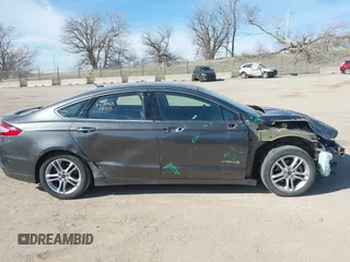 2016 Ford Fusion Titanium Hybrid с VIN 3FA6P0RU8GR266488, выставлен на аукционе IAAI как лот 41903919 с пробегом 74 927 миль миль и . История ставок и продаж доступна на DreamBid. Изображение 14.