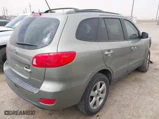 2009 Hyundai Santa Fe SE with VIN 5NMSH13E39H297907, listed as a IAAI auction lot 41708199 with 203,771 mi miles. Bid and sale history available at carsss.com. Image 4.