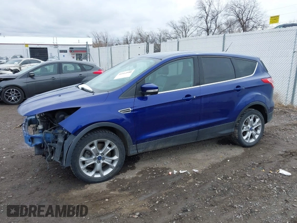 2013 Ford Escape SEL with VIN 1FMCU9H92DUA47288, listed as a IAAI auction lot 41912588 with 165,728 mi miles. Bid and sale history available at carsss.com. Image 2.