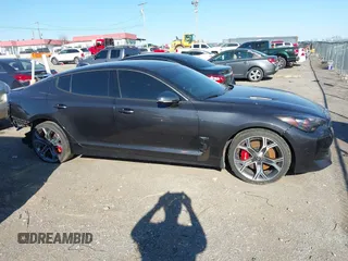 2021 Kia Stinger GT with VIN KNAE35LC4M6097199, listed as a IAAI auction lot 41884424 with 61,490 mi miles. Bid and sale history available at carsss.com. Image 12.