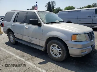 2003 Ford Expedition Special Service with VIN 1FMRU15W43LC14423, listed as a Copart auction lot 58082065 with 182,413 mi miles and Salvage title. Bid and sale history available at DreamBid. Image 4.