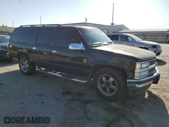 1999 Chevrolet Suburban with VIN 3GNEC16R3XG270099, listed as a Copart auction lot 71041704 with 269,329 mi miles and Salvage Title. Bid and sale history available at carsss.com. Image 4.