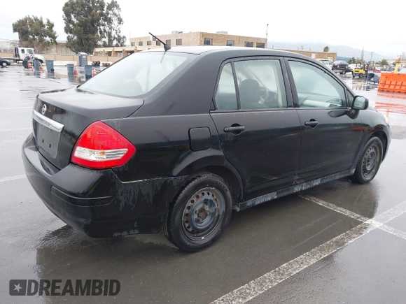 2011 Nissan Versa 1.8 S with VIN 3N1BC1AP7BL368816, listed as a IAAI auction lot 41794835 with 198,801 mi miles. Bid and sale history available at carsss.com. Image 4.