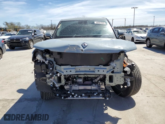 2022 Rivian R1T Adventure z VIN 7FCTGAAAXNN014983, wystawiony jako Copart lot #48987605 z przebiegiem Nie podano mil oraz Szkoda całkowita • Salvage title. Historia ofert i sprzedaży dostępna na DreamBid. Obrazek 5.