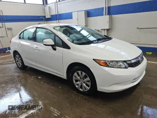 2012 Honda Civic LX z VIN 2HGFB2F50CH310377, wystawiony jako Copart lot #54486415 z przebiegiem 120 805 mil mil oraz Czysty tytuł • Clean title. Historia ofert i sprzedaży dostępna na DreamBid. Obrazek 4.