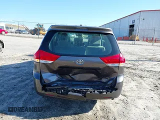 2014 Toyota Sienna L with VIN 5TDZK3DC3ES506658, listed as a IAAI auction lot 41469391 with 169,848 mi miles. Bid and sale history available at carsss.com. Image 6.