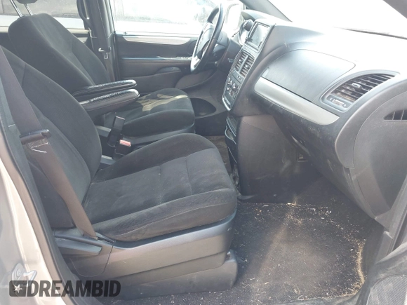 2015 Dodge Grand Caravan American Value with VIN 2C4RDGBG6FR576897, listed as a IAAI auction lot 41780897 with 159,823 mi miles and . Bid and sale history available at DreamBid. Image 5.