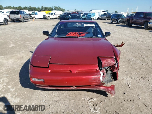 1989 Nissan 240SX z VIN RS13604765, wystawiony jako Copart lot #46514985 z przebiegiem 115 929 mil mil oraz Szkoda całkowita • Salvage title. Historia ofert i sprzedaży dostępna na DreamBid. Obrazek 5.