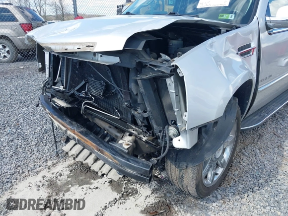 2010 Cadillac Escalade Luxury z VIN 1GYUKBEF1AR269054, wystawiony jako IAAI lot #39255908 z przebiegiem 96 965 mil mil oraz . Historia ofert i sprzedaży dostępna na DreamBid. Obrazek 6.