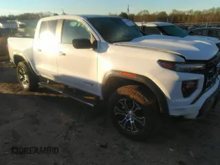 2023 GMC Canyon 4WD AT4 with VIN 1GTP6DEK0P1260420, listed as a IAAI auction lot 41864560 with 1 mi miles. Bid and sale history available at carsss.com. Image 1.